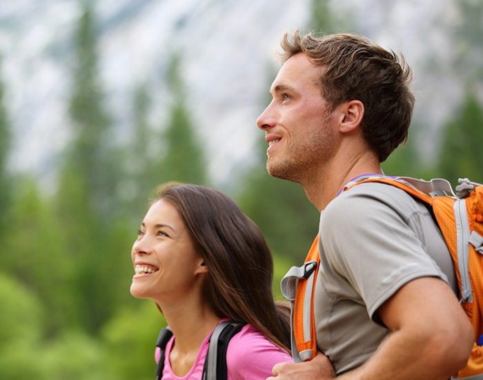 man and woman hiking